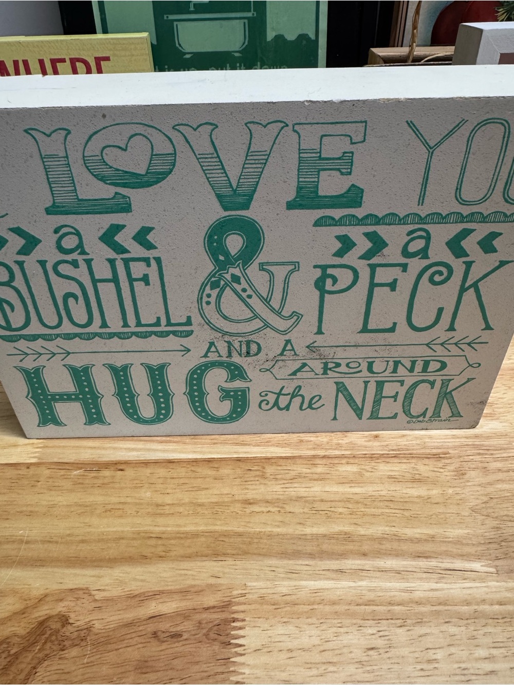 Decorative 'Love You a Bushel & Peck' Green Wall Plaque